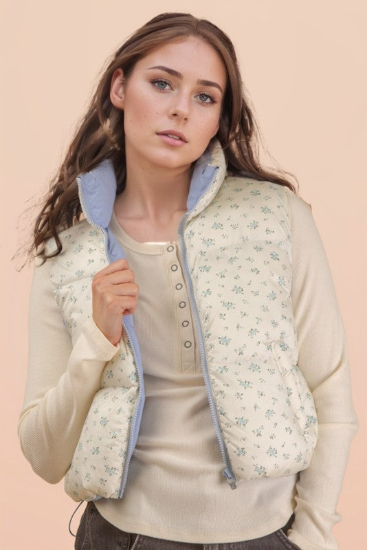 Floral cropped puffer vest with mock neck and zipper front