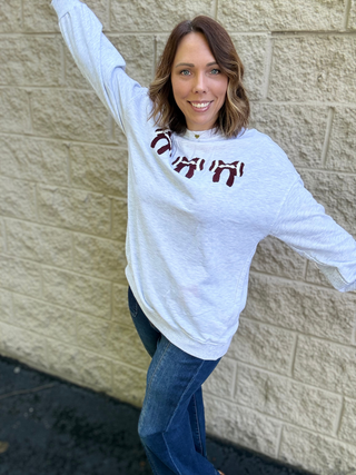 Gameday Coquette: Chenille Football Bow Oversized Sweatshirt
