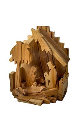Handcrafted 4-inch olive wood one-piece nativity scene made in Bethlehem featuring the Holy Family.