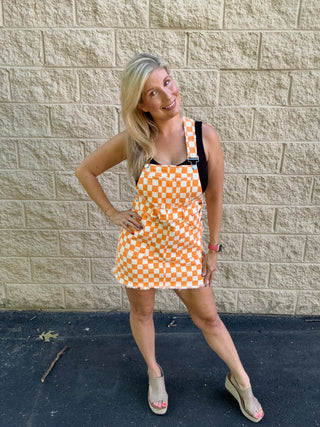 orange and white game day dresses Orange & White Overall Bib Checkerboard Dress  Josie's Boutique
