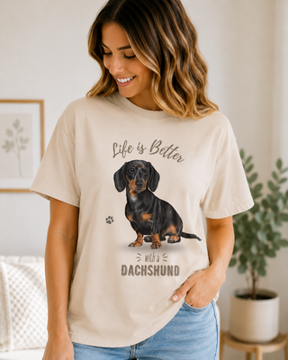 Unisex T-shirt featuring a black dachshund graphic and text 'Life is Better with a Dachshund'.