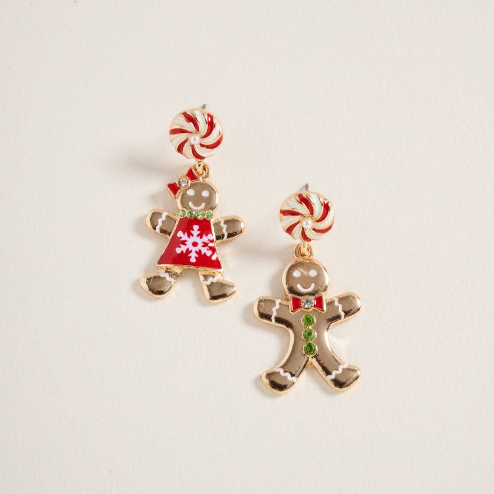 Mismatched gingerbread boy and girl earrings with peppermint candy cane post tops displayed on a neutral background.