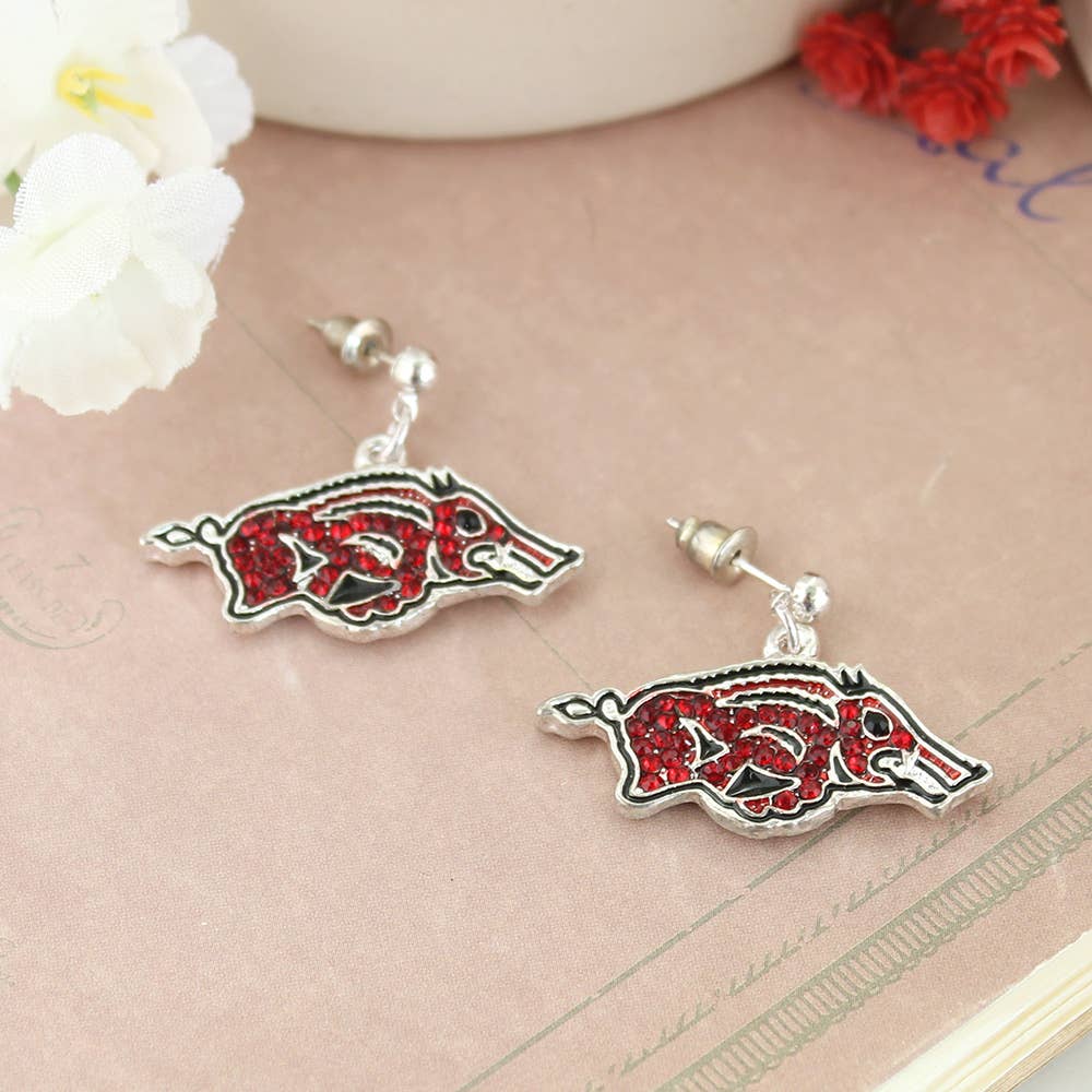 Silver-plated Arkansas Razorbacks logo earrings with red rhinestones and black enamel accents — officially licensed game-day jewelry from The Pink Doxie.