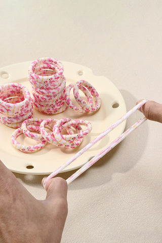 Pink flamingo printed elastic hair tie made from soft polyester, a cute and gentle everyday hair accessory from The Pink Doxie Boutique.