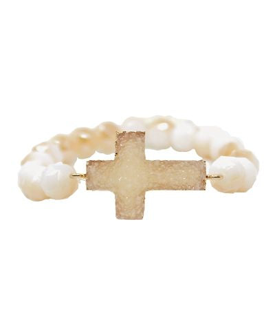 Cream beaded bracelet with druzy cross centerpiece