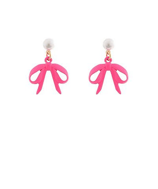 Pink bow drop earrings with faux pearl studs displayed on a white background from The Pink Doxie Boutique.
