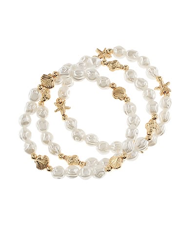 Set of beach themed pearl and gold beaded bracelets