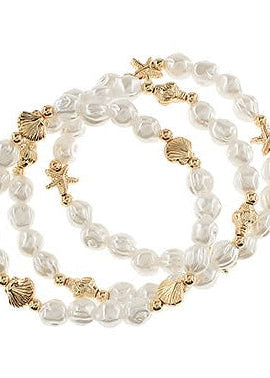 Set of beach themed pearl and gold beaded bracelets