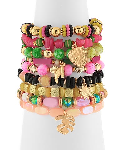 Stack of colorful beaded boho bracelets with various charms 