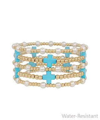 Stack of beaded bracelets with turquoise 