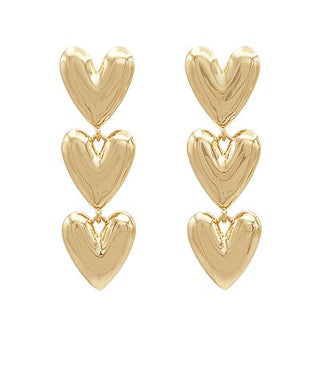 Triple puffy heart drop earrings in gold, silver, or vintage gold metal with post back closure from The Pink Doxie Boutique.