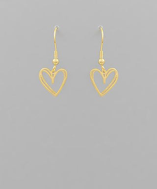 Gold metal heart drop earrings with fish hook closure displayed on a neutral background from The Pink Doxie Boutique.