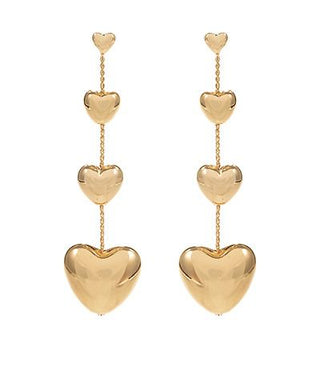 Gold-tone heart drop earrings featuring three cascading hearts on a delicate chain with hypoallergenic posts from The Pink Doxie Boutique.