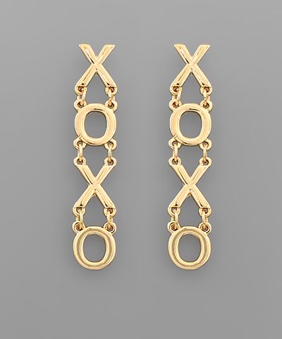 Gold-tone XOXO drop earrings with linked letter design displayed on a neutral background from The Pink Doxie Boutique.