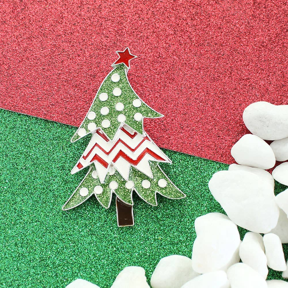 Silver-plated enamel Christmas tree pendant with red zigzag and green glitter details — festive holiday jewelry from The Pink Doxie.