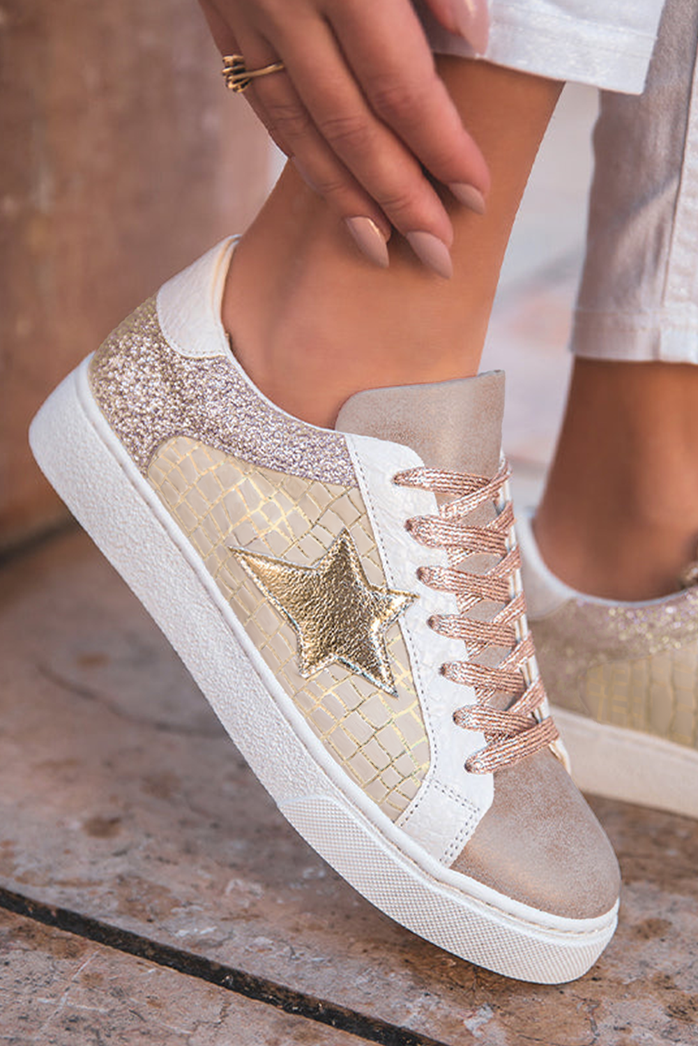 Gold glitter star patchwork PU leather sneakers with lace-up closure and shimmer detail — preorder item from The Pink Doxie.