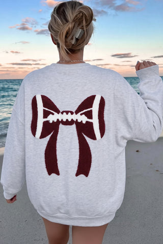 Gameday Coquette: Chenille Football Bow Oversized Sweatshirt