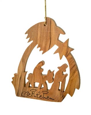 Handcrafted olive wood ornament depicting the Holy Family’s flight to Egypt, made in Bethlehem.