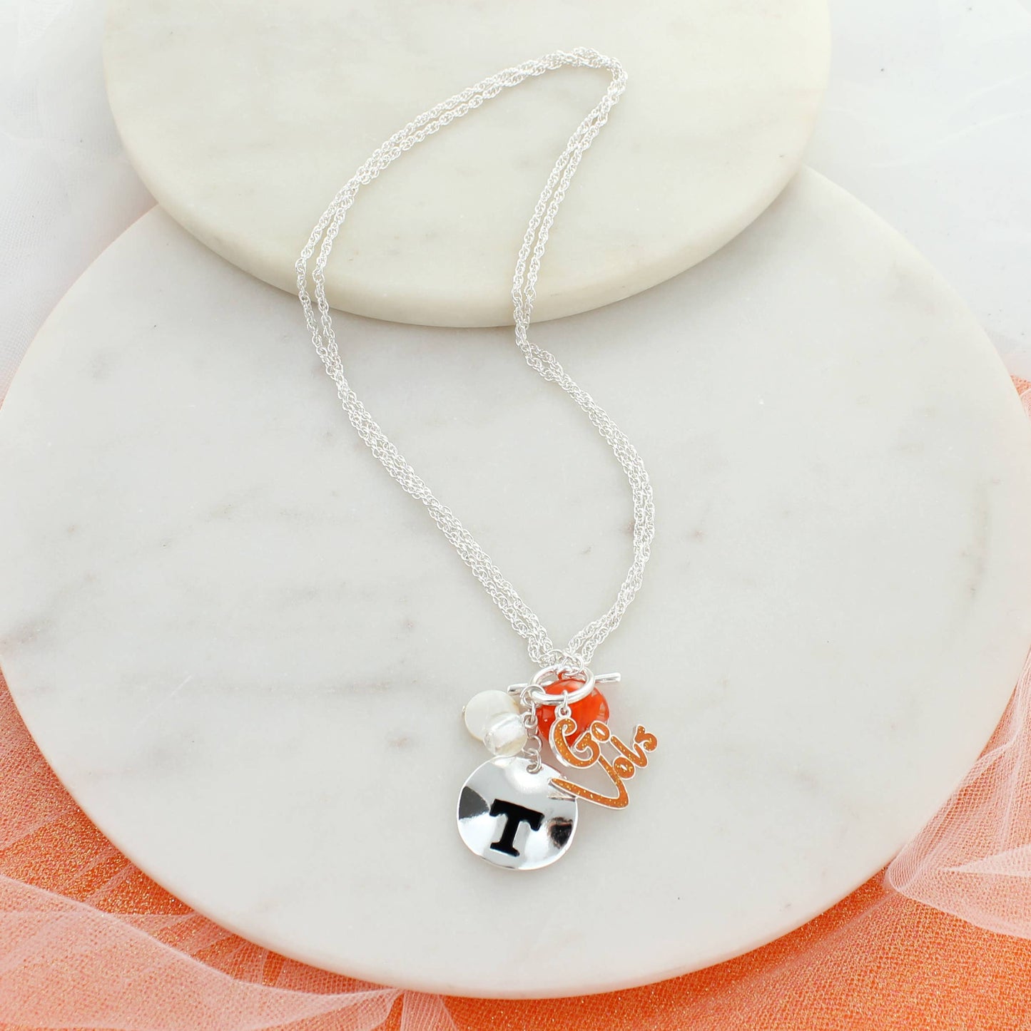Silver Tennessee Vols necklace with Power T charm, orange bead, and Go Vols pendant — convertible 18”–36” chain from The Pink Doxie.