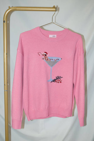 Pink sweater with a dachshund in a cocktail glass graphic, long sleeves, and a crew neckline.