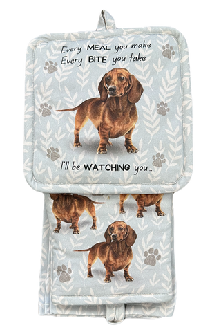 Oven mitt set featuring a dachshund print with paw designs and a humorous message.