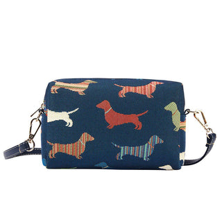 Blue hip bag with colorful dachshund pattern and detachable shoulder strap.