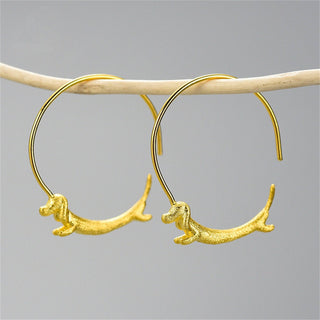 Gold plated hoop earrings featuring a dachshund design in 925 sterling silver.