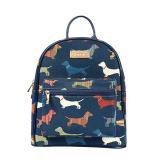 Navy blue daypack bag with colorful dachshund print, front zip pocket, and adjustable straps.