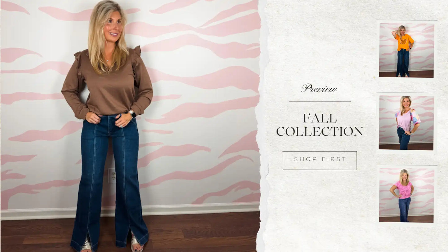 Woman wearing brown top and dark blue jeans.